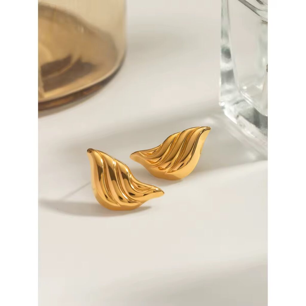 Twirl Glow Earrings by Cleo Jewelry – lightweight spiral gold-plated hoops for elegant everyday and evening wear, hypoallergenic and tarnish-resistant